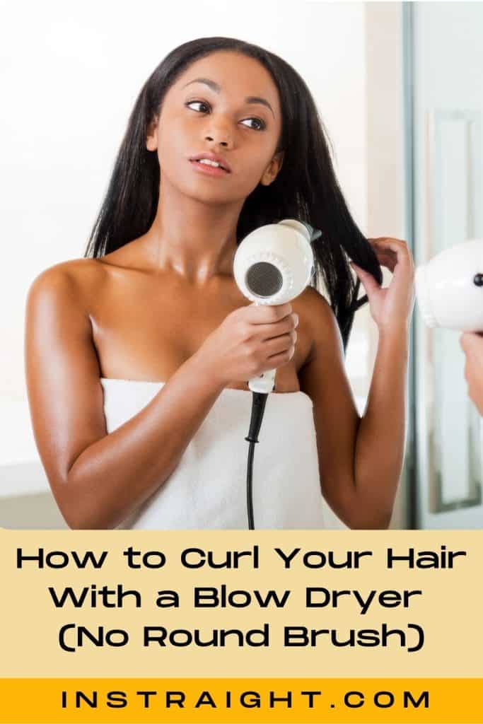 black woman showing how to curl your hair with a blow dryer without a round brush (1)